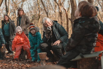 Forest school session in the woods with a puppet toy