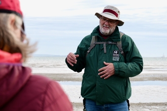 Tim project lead of our Seagrass Restoration Project talking to volunteers
