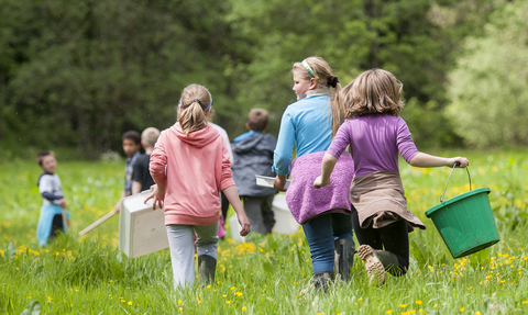 Children preparing to take a river kick sample © Ross Hoddinott/2020VISION