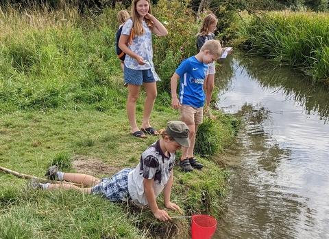 Children doing the Chalk Stream Challenge © Katy Seaman